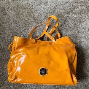 Dooney &Burke mustard color bag